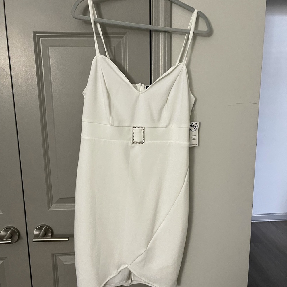 All white brand new dress from Fashion to Figure